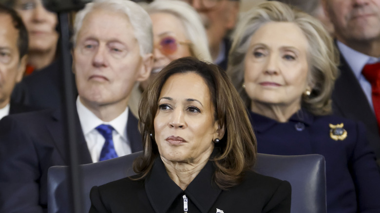 Bill Clinton, Kamala Harris, Hillary Clinton sitting