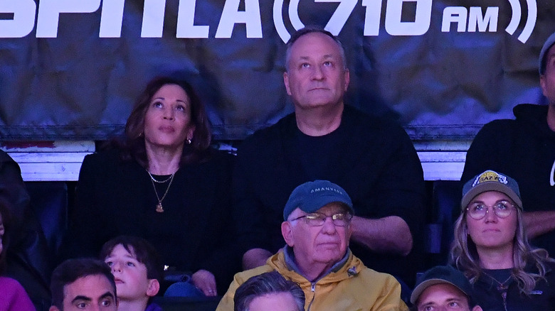 Kamala Harris and Doug Emhoff watching a basketball game