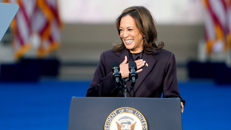 Kamala Harris smiing at podium