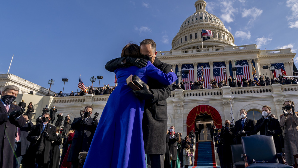 Douglas Emhoff and Kamala Harris embracing