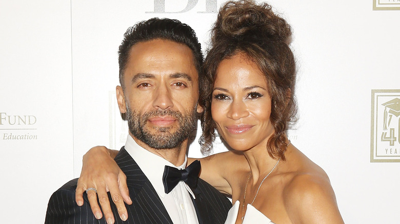 Kamar de los Reyes and Sherri Saum posing