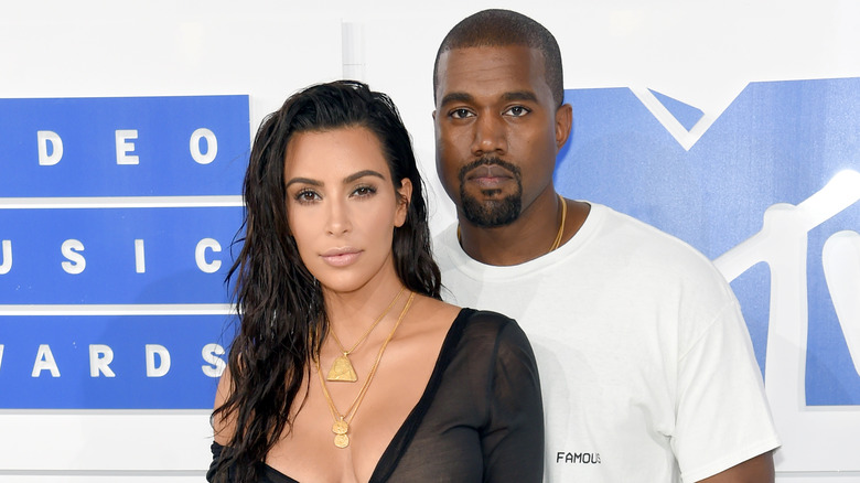 Kim Kardashian and Kanye West on the red carpet.