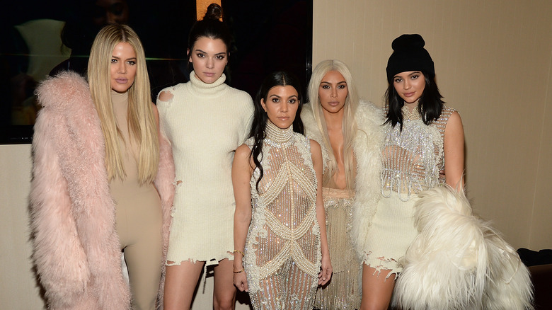 The Kardashians and Jenners standing together