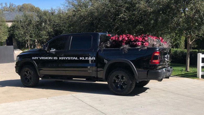 Kanye truck filled with roses "My vision is Krystal Klear"