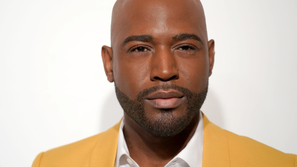 Karamo Brown in yellow suit