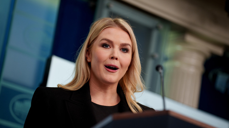 Karoline Leavitt speaks at a podium