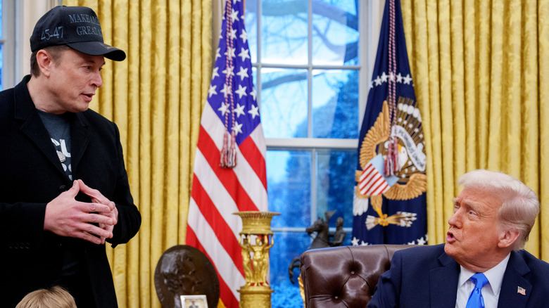 Donald Trump and Elon Musk speak in the Oval Office