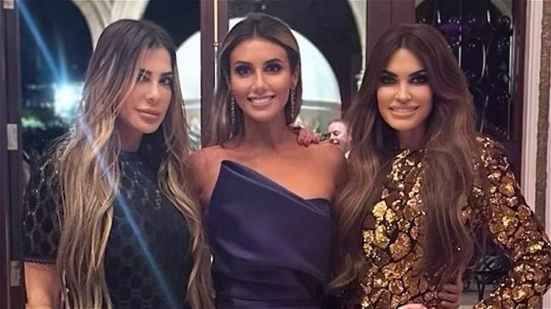 Siggy Flicker, Alina Habba, and Kimberly Guilfoyle pose for photo