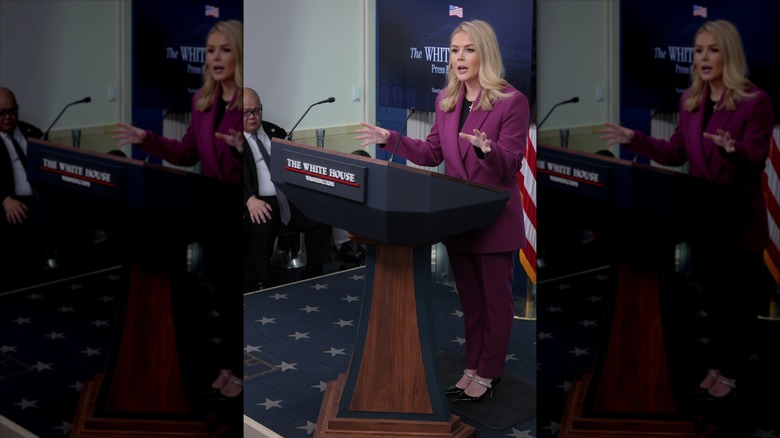 Karoline Leavitt speaking at a podium