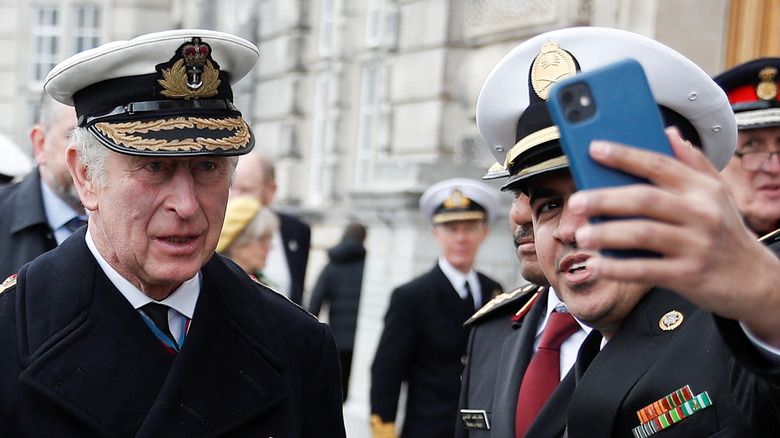 Prince Charles posing for a selfie