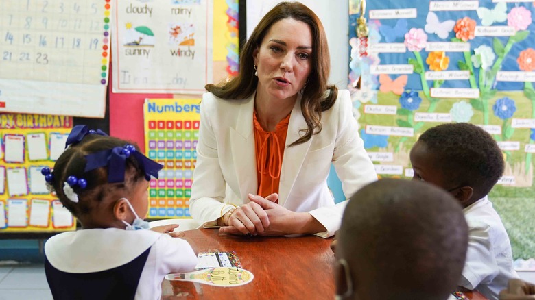 Kate Middleton speaking with children in Jamaica