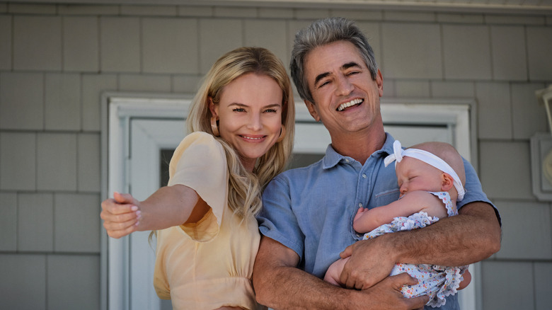 Heidi, Robert, and baby smiling