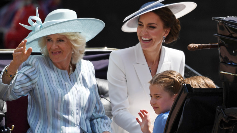 Kate and Camilla riding in carriage together