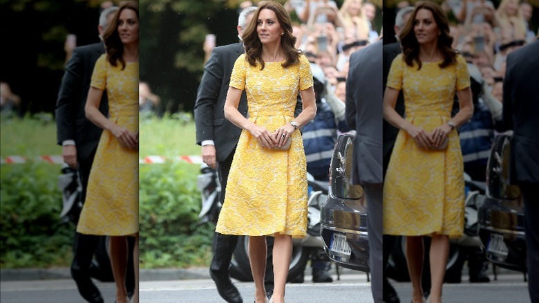 Princess Catherine in yellow Jenny Packham dress with Prince William 