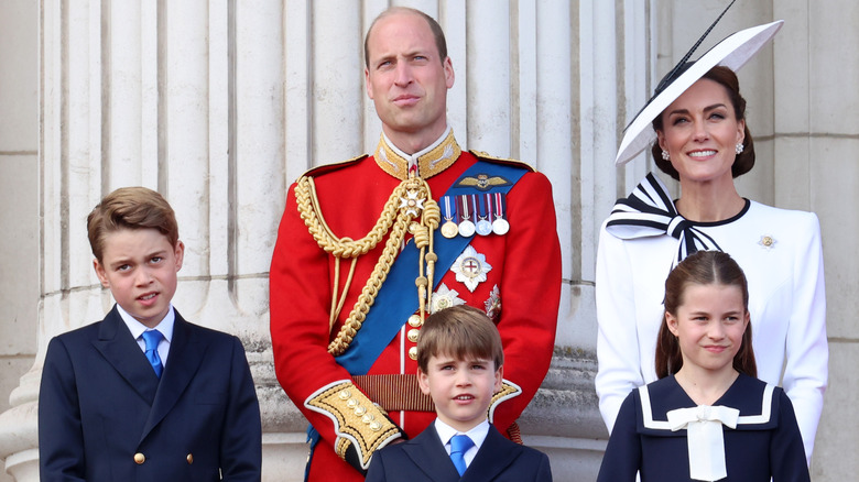 Prince George, Prince William, Prince Louis, Kate Middleton, and Princess Charlotte standing together