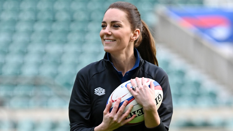 Kate Middleton with a rugby ball