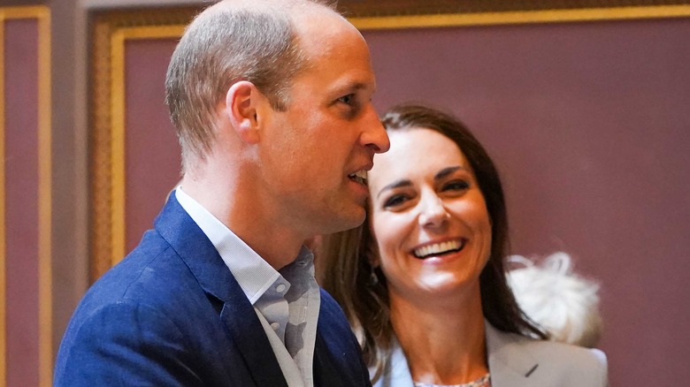 Kate Middleton smiling at Prince William