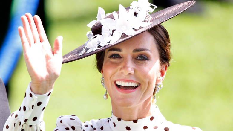 Princess Catherine smiling and waving