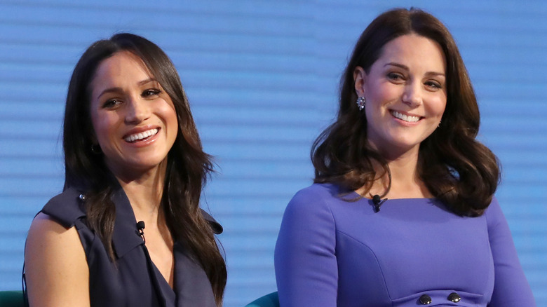 Kate Middleton and Meghan Markle at an event