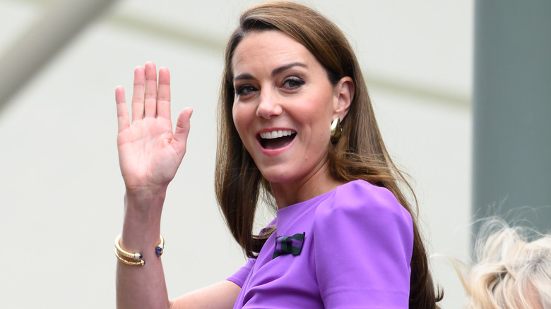 Kate Middleton smiling and waving