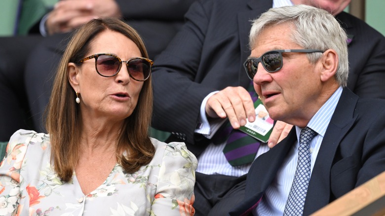 Carole Middleton Michael Middleton talking in sunglasses