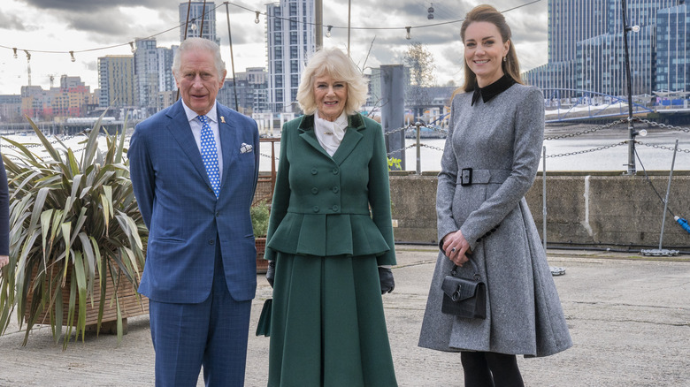 Kate Middleton poses with Prince Charles and Duchess Camilla. 