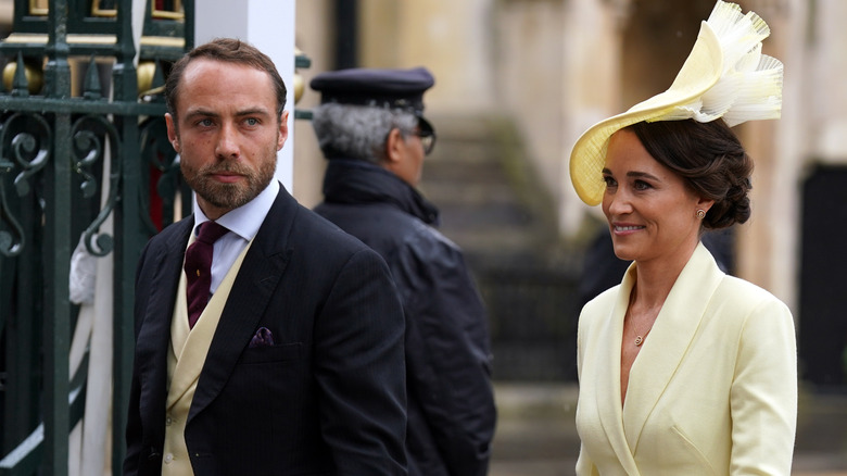 James Middleton looking serious and Pippa Middleton Matthews smiling