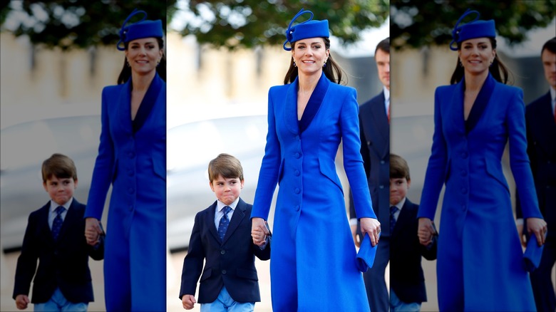 Kate Middleton holding Prince Louis' hand