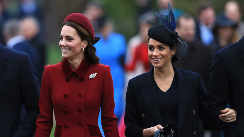 Kate Middleton & Meghan Markle walking outside together