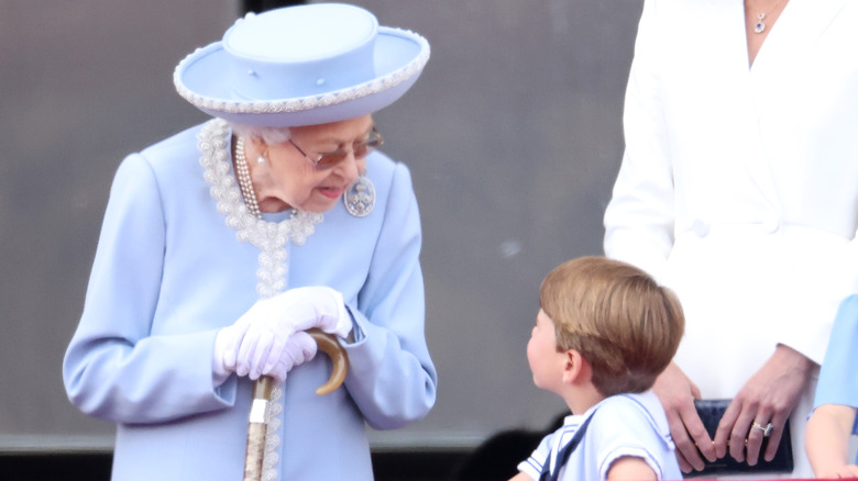 Queen Elizabeth talking to Prince Louis