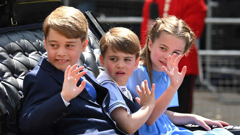 Prince George, Prince Louis, and Princess Charlotte waving