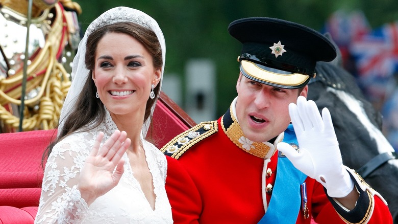 Kate Middleton Prince William smiling and waving on wedding day