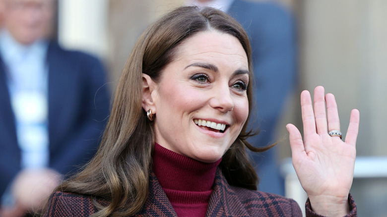 Kate Middleton smiling and waving