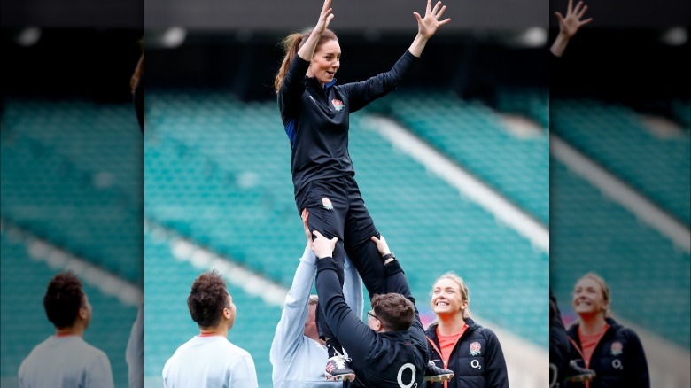 Kate Middleton being lifted by England Rugby players 