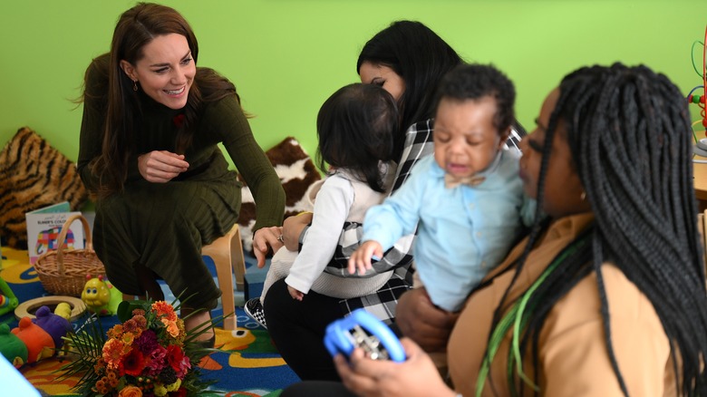 Kate talking with parents and kids