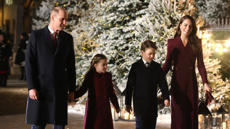 Kate Middleton and Prince William with their kids at a Christmas event 