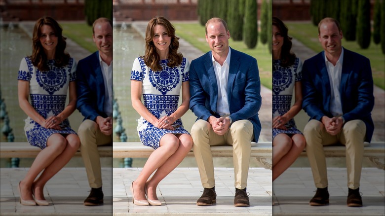 Kate Middleton and Prince William sitting on a bench in front of the Taj Majal