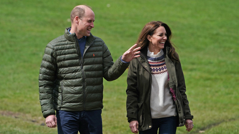 Prince William, Kate Middleton laughing, walking