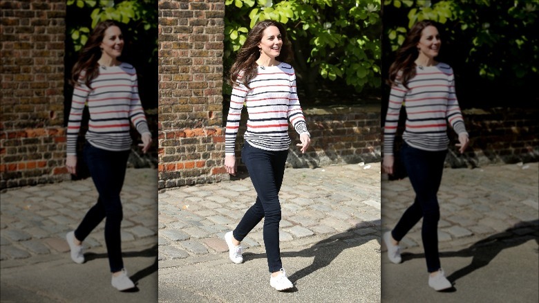 Kate Middleton walking wearing striped top