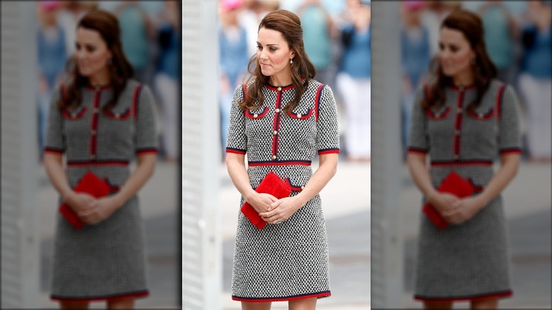 Kate Middleton posing in tweed dress