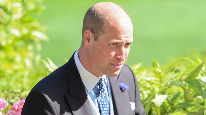 Prince William looking pensive and serious