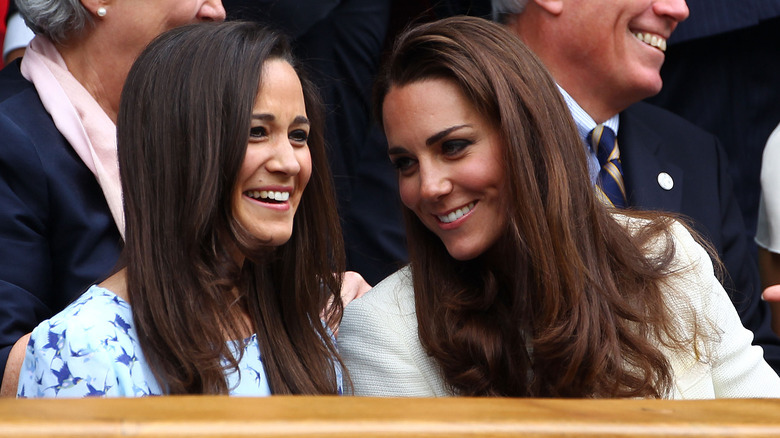 Kate and Pippa Middleton at an event.