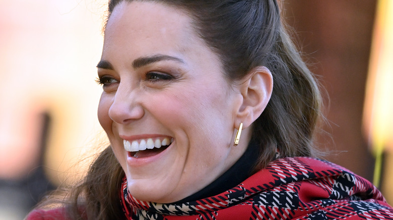 Kate Middleton laughing outside