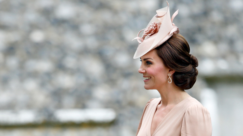 Kate Middleton smiling at Pippa Middleton's wedding