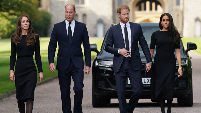 Prince William and Prince Harry with Kate Middleton and Meghan Markle