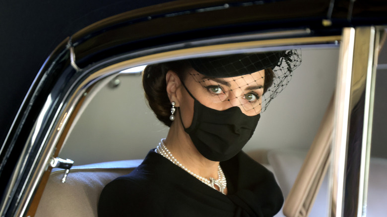 Princess Kate in car in black