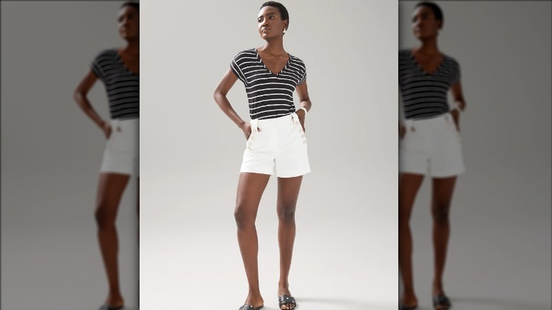 Model wearing nautical white shorts 