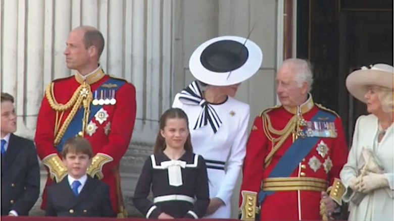 Kate Middleton chatting with King Charles; Prince William looking away