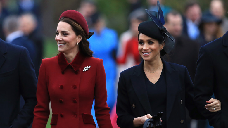 Kate Middleton and Meghan Markle walking