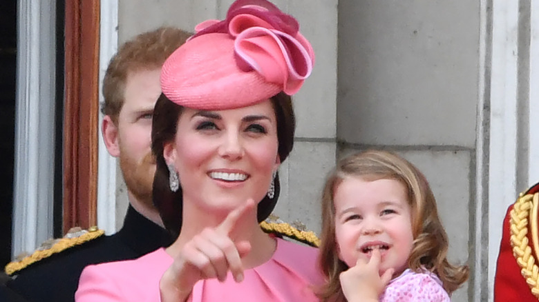 Kate Middleton holding baby Princess Charlotte